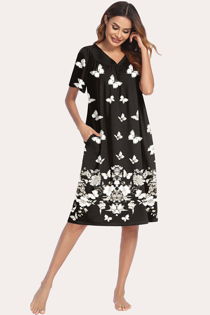 Black short-sleeve nightgown with V-neck and scattered white butterfly prints