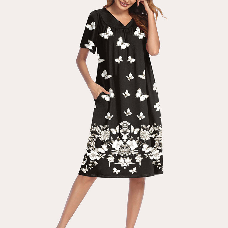 Black short-sleeve nightgown with V-neck and scattered white butterfly prints