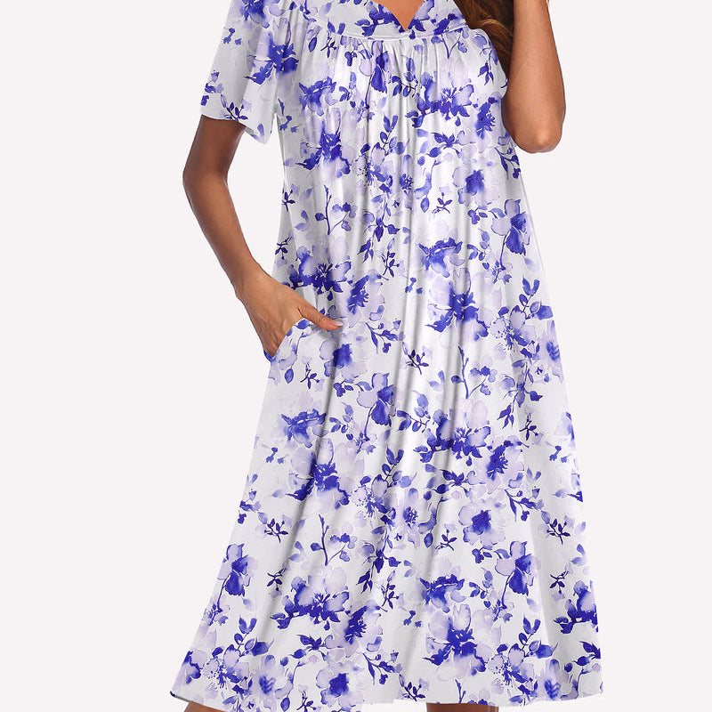 Women’s short-sleeve nightgown in white with blue floral print, ruffled round neckline