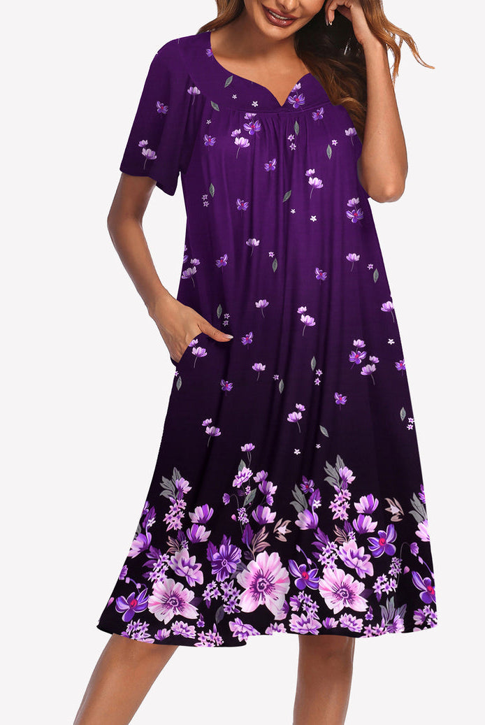 Short-sleeve lounger nightgown in deep purple with small purple floral print and V-neck.