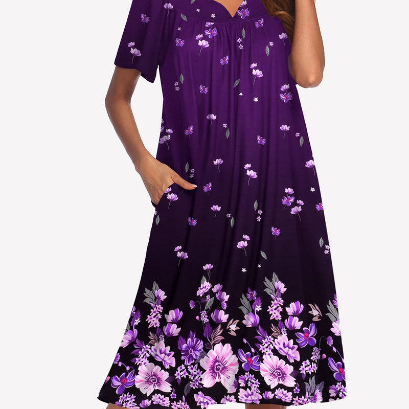 Short-sleeve lounger nightgown in deep purple with small purple floral print and V-neck.