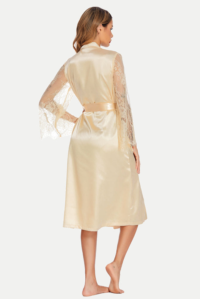 Cream satin kimono robe with lace sleeves, highlighting waist, perfect for luxurious comfort.