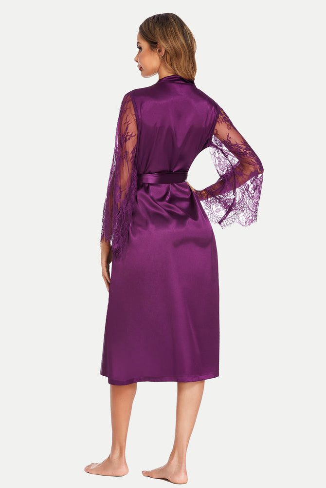 Purple satin kimono robe with lace sleeves, highlighting waist, luxurious comfort, elegant style.