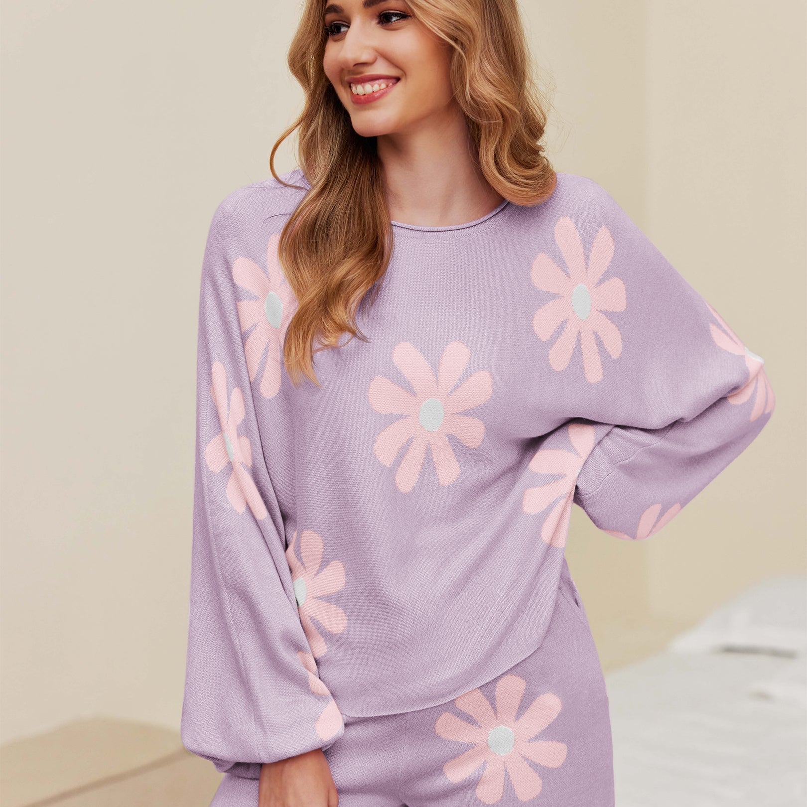 Purple daisy knit pajama set with long sleeves and matching shorts