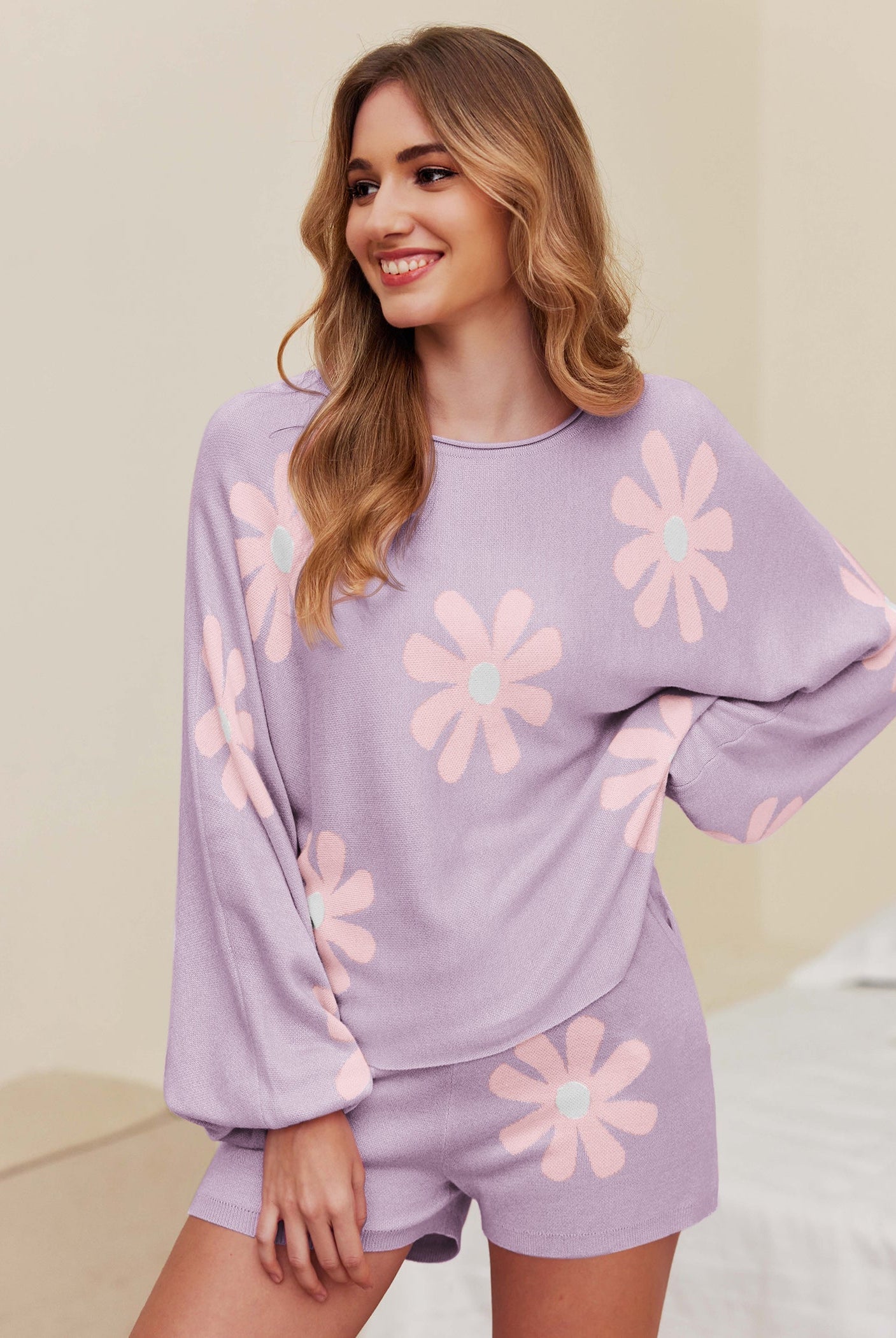 Purple daisy knit pajama set with long sleeves and matching shorts
