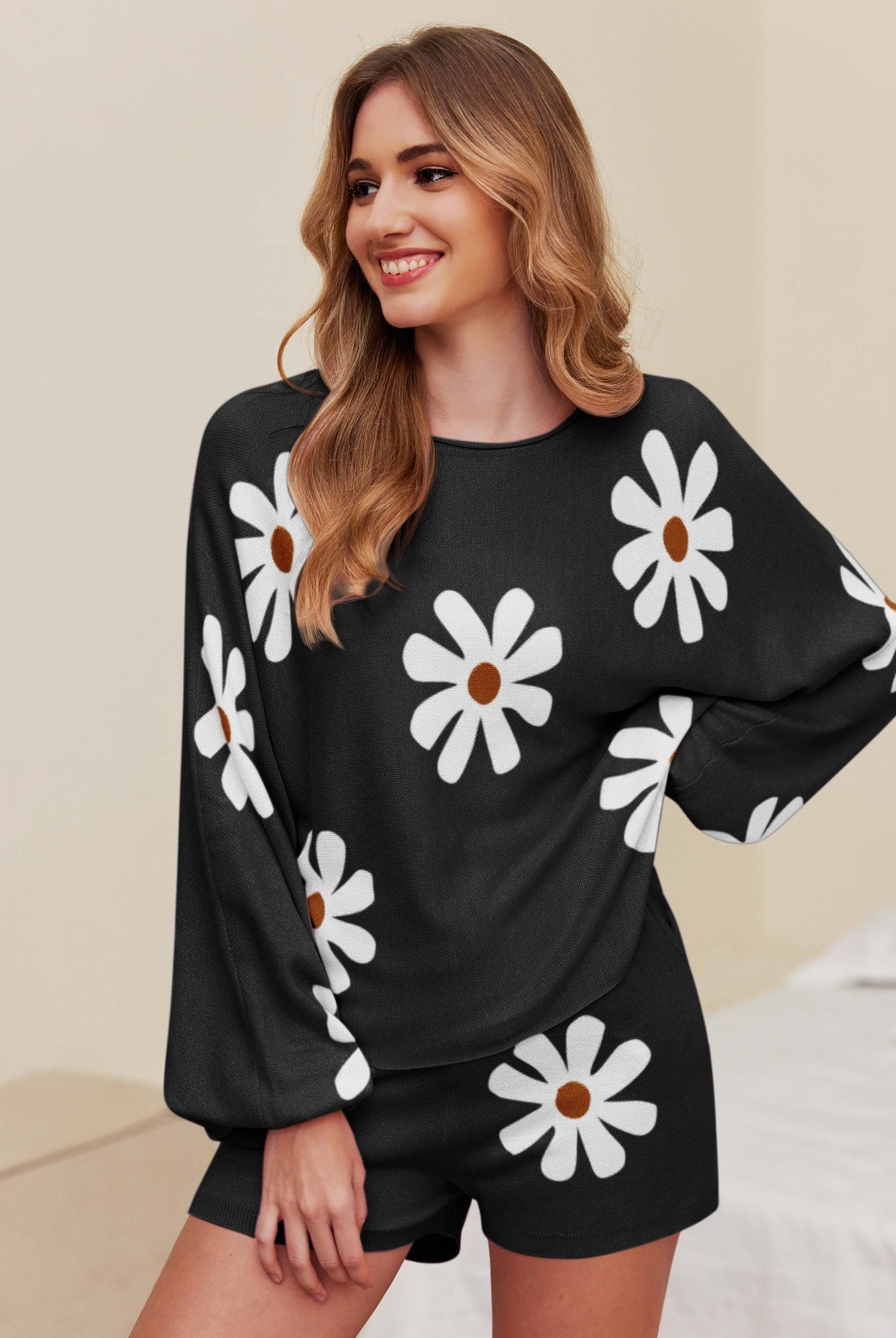 Black daisy knit pajama set with long sleeves and matching shorts