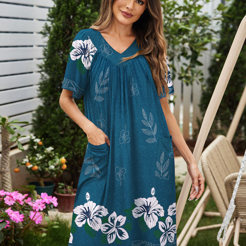Teal nightdress with V-neck, gathered yoke, short sleeves, large floral print, side pocket