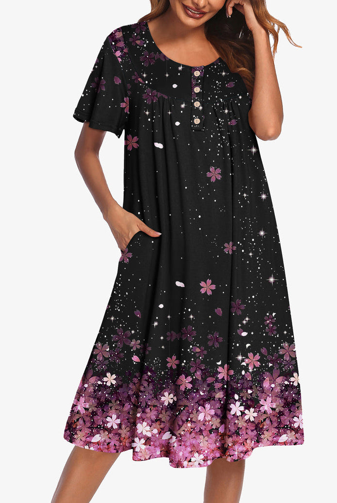 Black short-sleeve floral dress with pink blossoms and button front