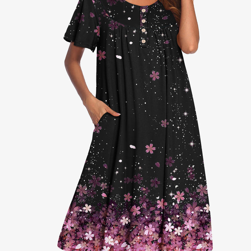 Black short-sleeve floral dress with pink blossoms and button front