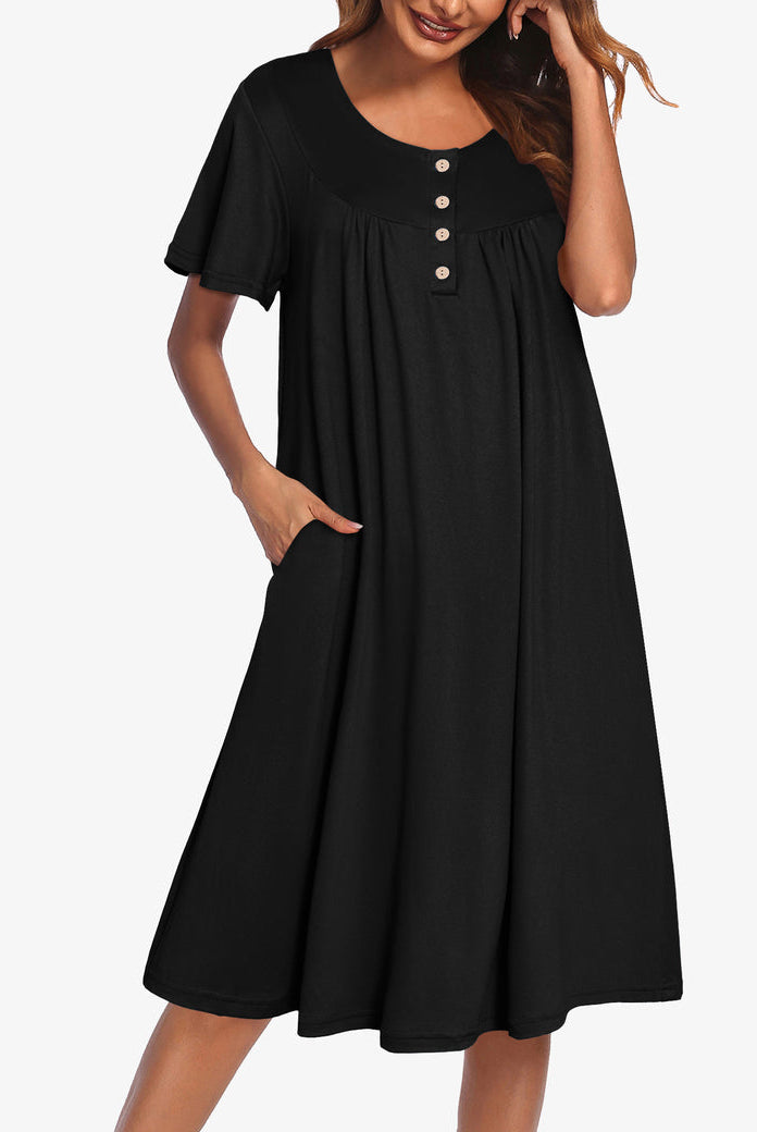 Black short-sleeve button front dress with gathered neckline and flared skirt