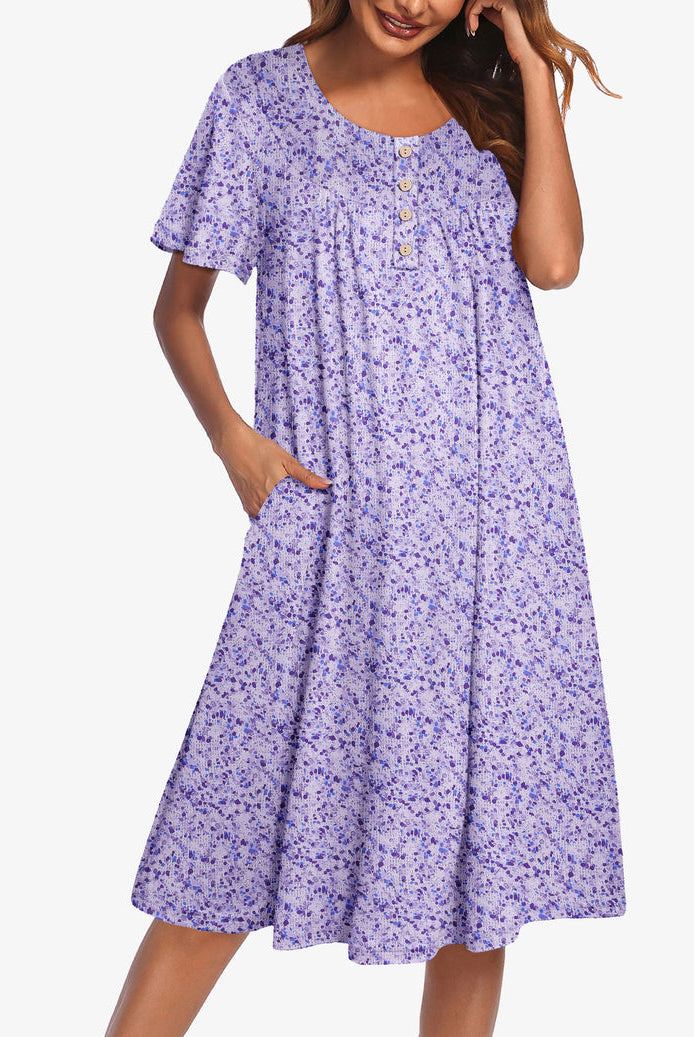 Lavender floral short-sleeve dress with button front and gathered yoke