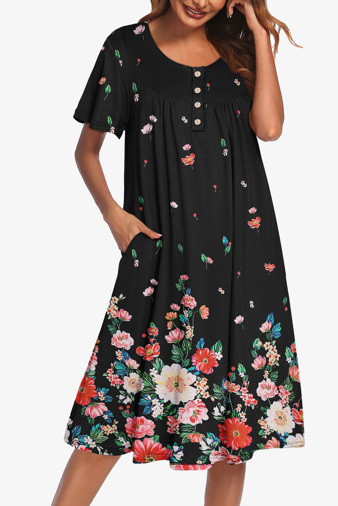 Black floral short-sleeve dress with button front and gathered yoke