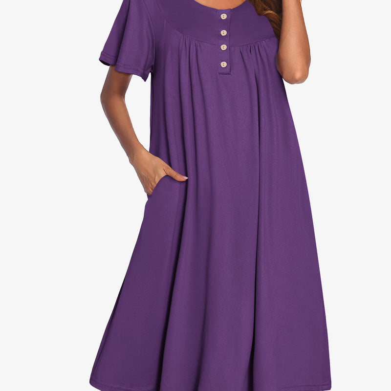 Purple short-sleeve dress with button front and gathered yoke