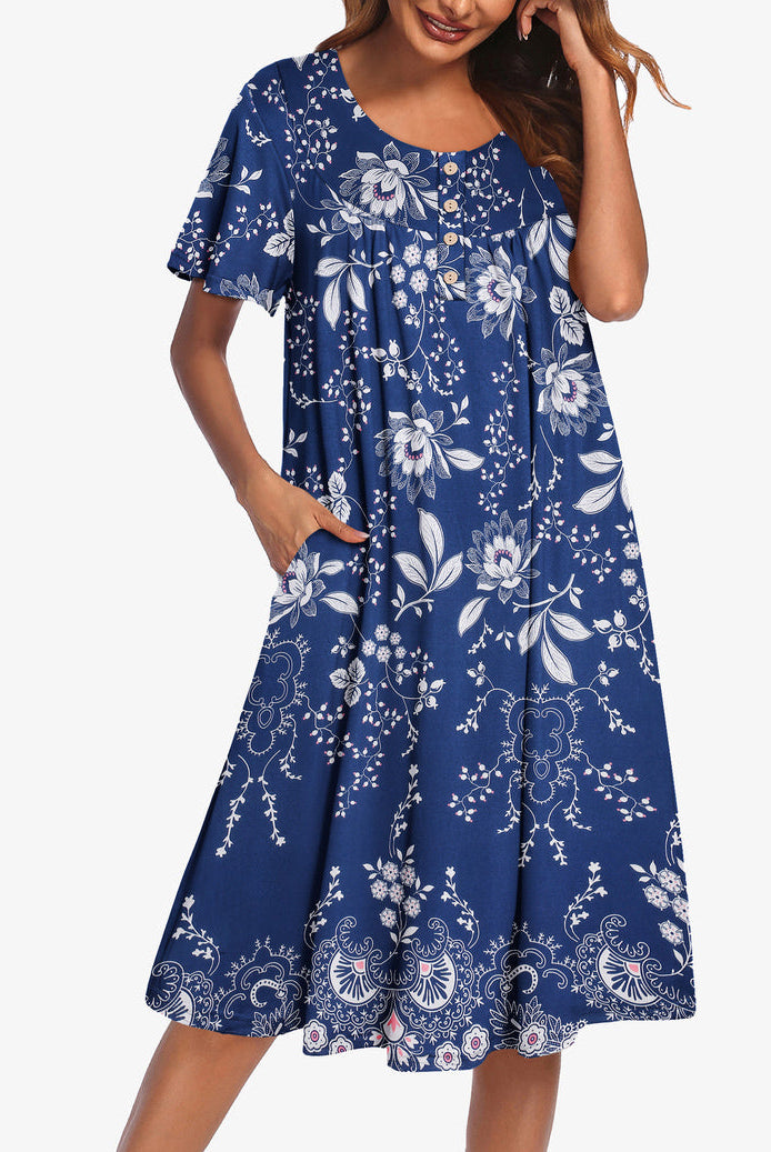 Blue floral short-sleeve dress with button front and gathered yoke