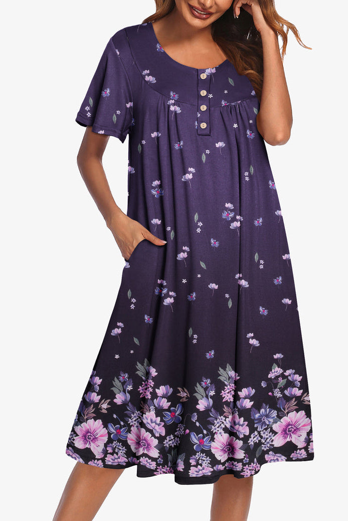 Dark purple floral short-sleeve dress with button front and gathered yoke