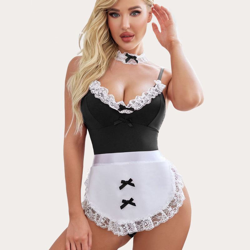 Maid costume lingerie set: black teddy, lace apron, and choker with bow accents for a sexy look.