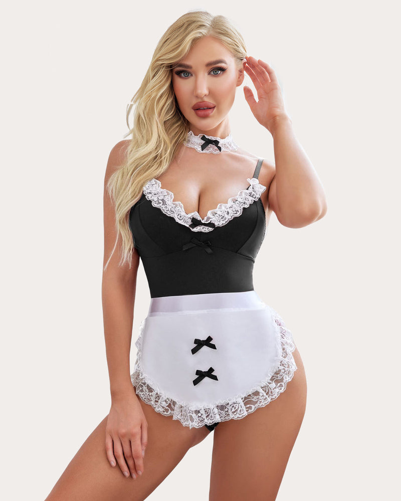 Maid costume lingerie set: black teddy, lace apron, and choker with bow accents for a sexy look.