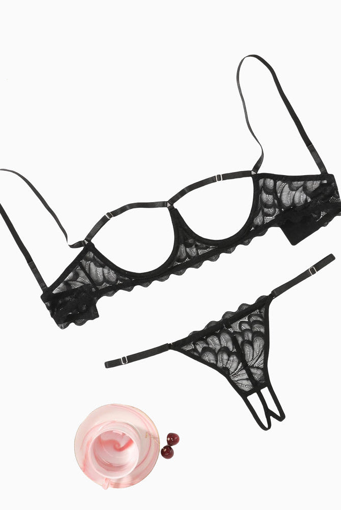 Black lace bra and panty set with scalloped trim, underwire cups, adjustable straps
