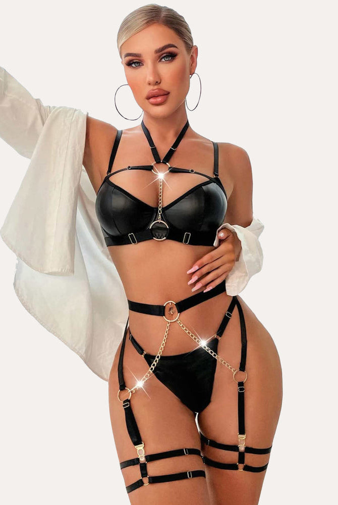 Black push-up bra and garter set with chain details. Sexy and flattering lingerie set for women.