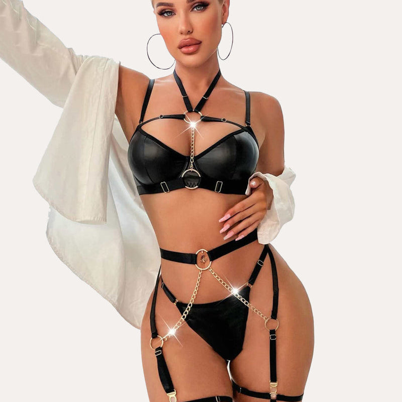 Black push-up bra and garter set with chain details. Sexy and flattering lingerie set for women.