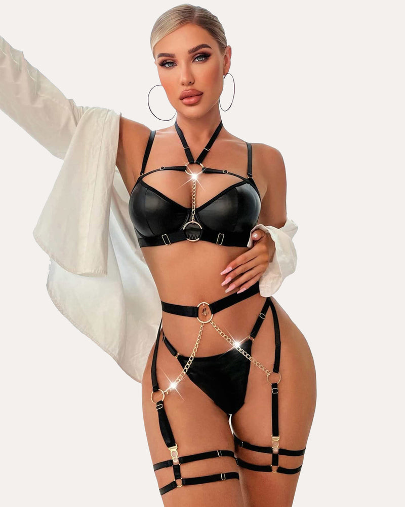 Black leather lingerie set with chain detailing, push-up bra, garter belt, and adjustable straps.