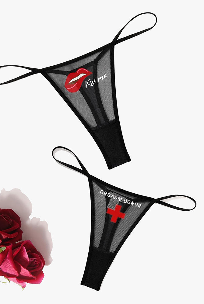 Black low-rise mesh thong panties with "Kiss me" and "ORGASM DONOR" prints, sexy lingerie