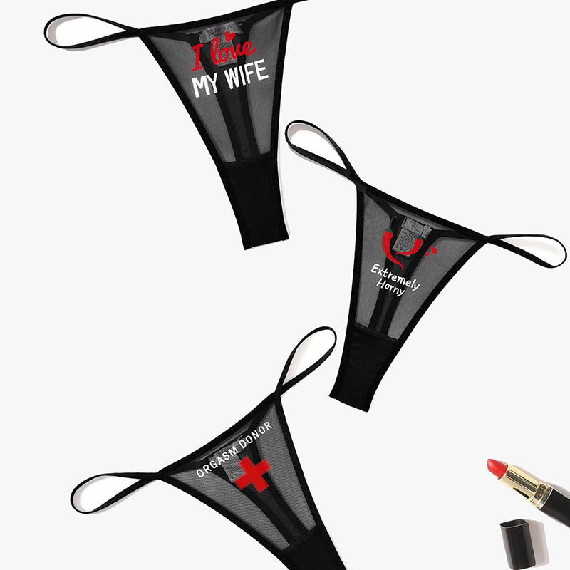Black mesh thong panties with printed phrases; sexy lingerie for women; low rise V-back panties
