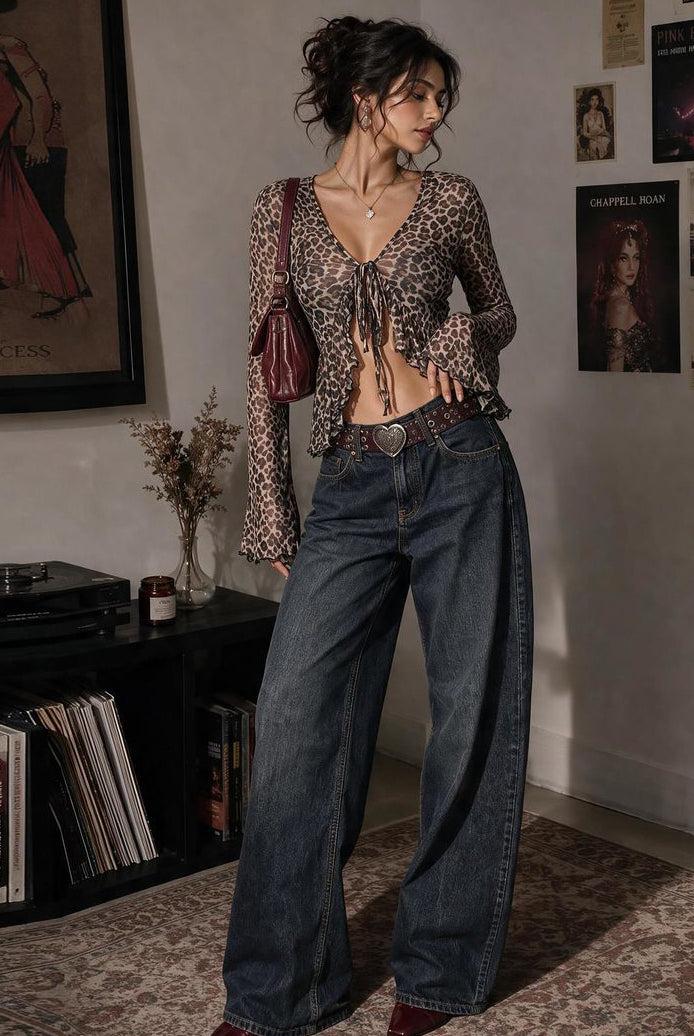 Leopard sheer mesh tie-front shrug with bell sleeves and ruffled hem.