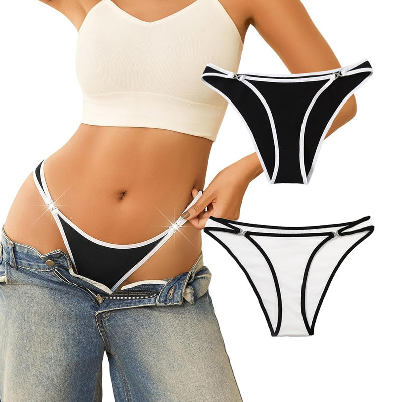Black low rise thong panty with rhinestone accents, white trim, sensual lingerie, beige crop top.