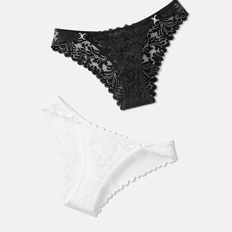 Low-rise cheeky lace tangas set in black and white
