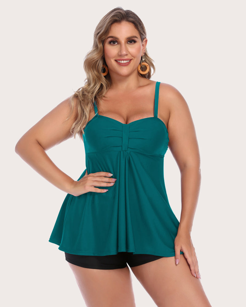 Teal tankini swimsuit with adjustable straps and black swim shorts. Retro swimwear