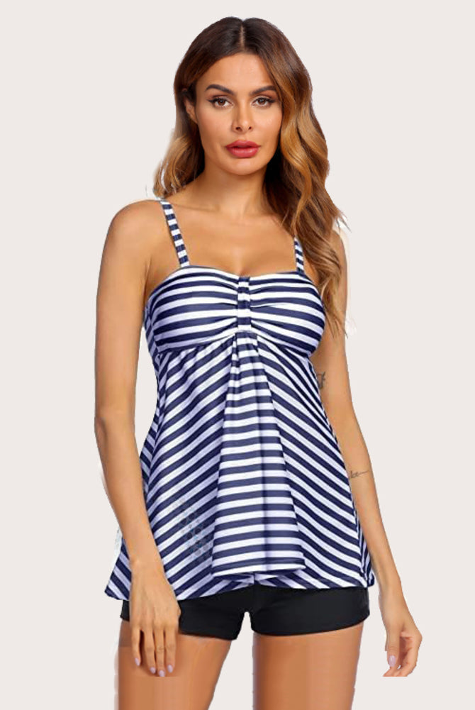 Women's striped tankini swimsuit set with adjustable straps and black swim shorts. Stylish swimwear.