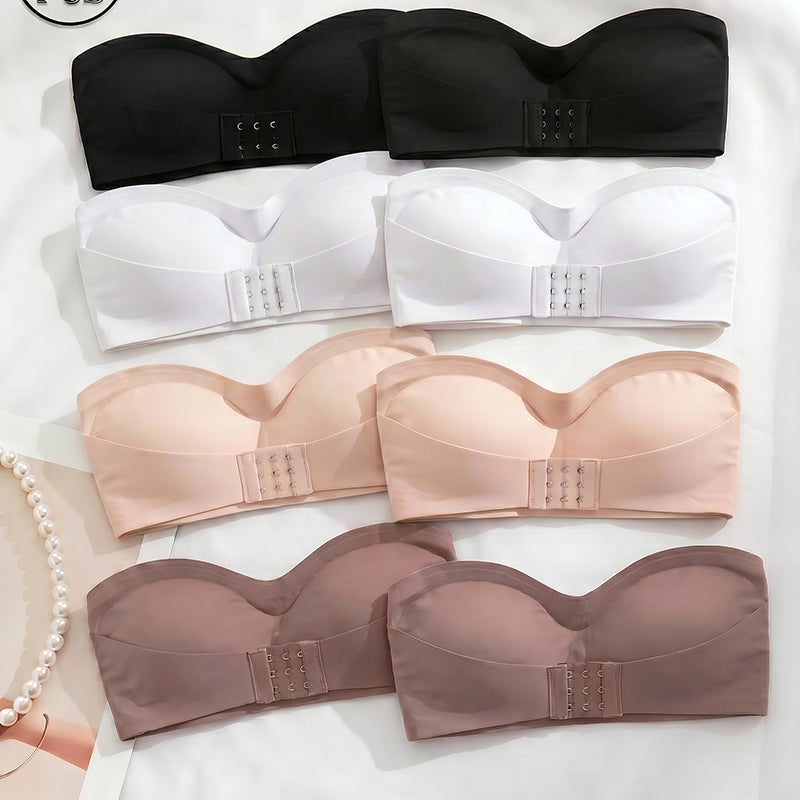 Set of strapless bandeau tops with buckle front in black, white, nude, and brown