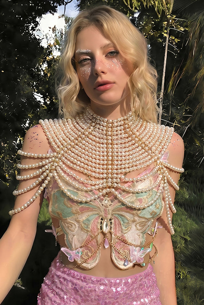 Pearl beaded butterfly sequin top with layered necklace detail and pink sequin mini skirt