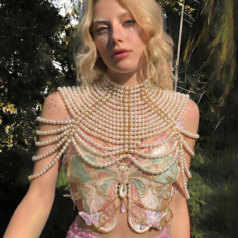 Pearl beaded butterfly sequin top with layered necklace detail and pink sequin mini skirt