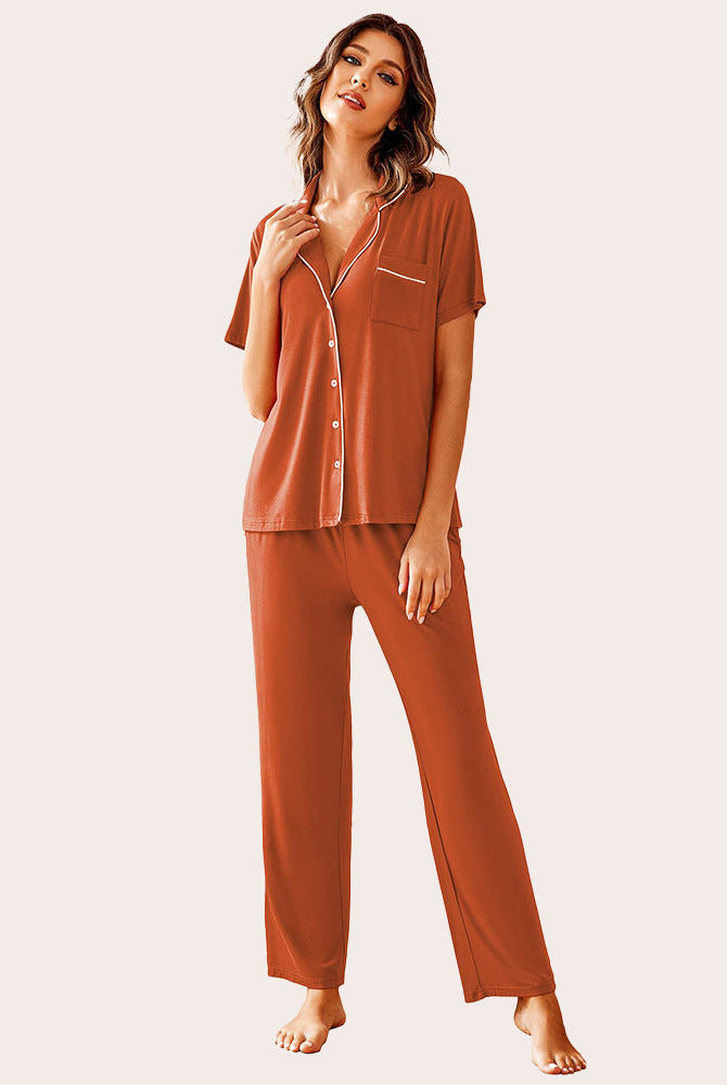 Rust-colored notch collar pajamas set. Soft, comfy sleepwear with white trim and chest pocket.