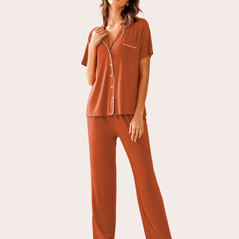 Rust-colored notch collar pajamas set. Soft, comfy sleepwear with white trim and chest pocket.