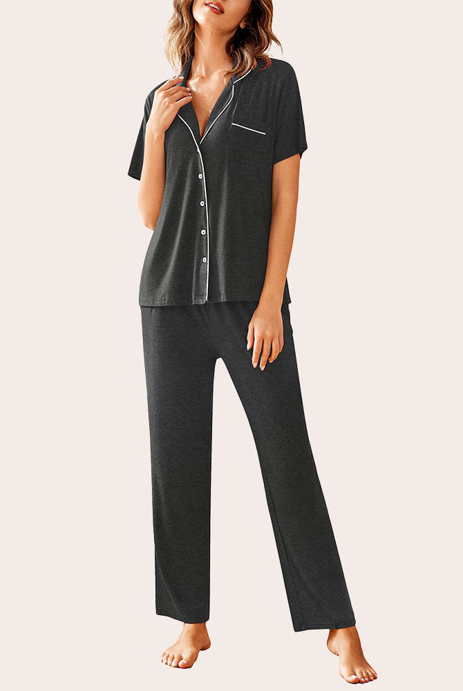 Dark grey notch collar soft pajamas set for women with white piping, featuring a short-sleeve button-down top and long pants.