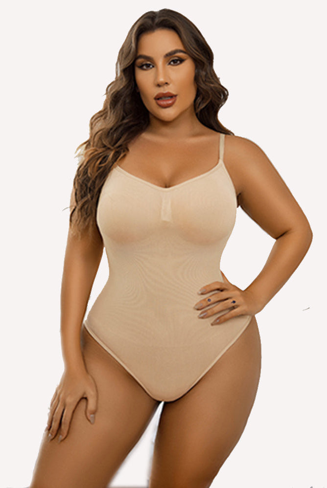 Skin-tone V-neck bodysuit shapewear, adjustable straps and smooth finish.
