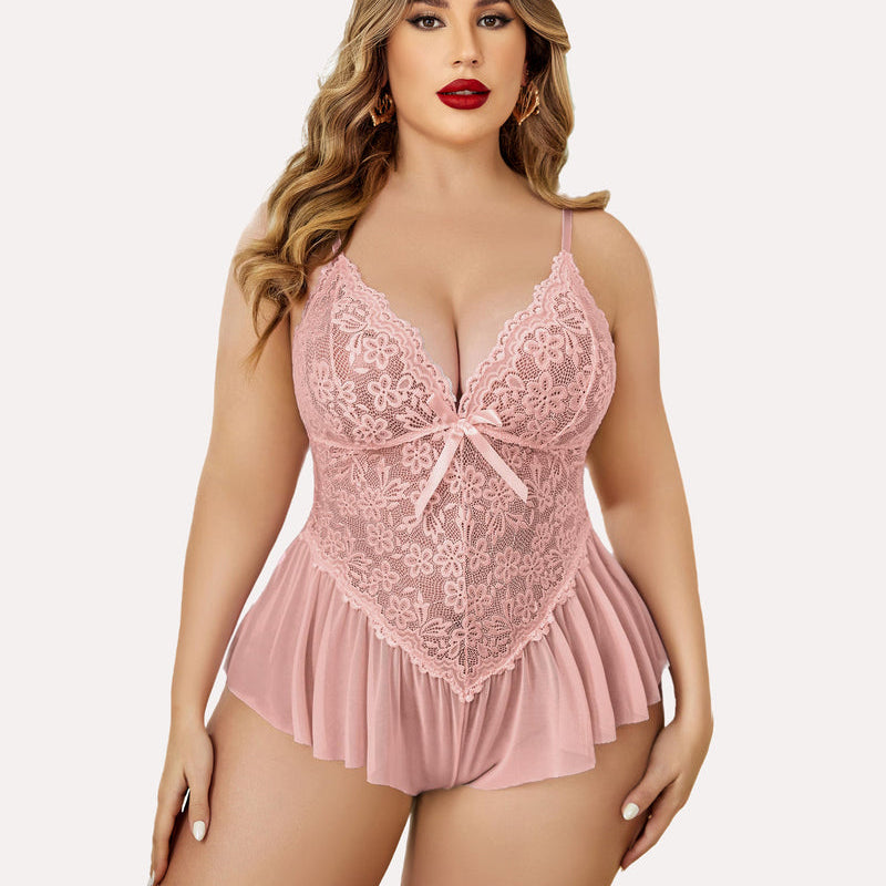 Plus size pink lace teddy, adjustable straps, ruffle trim. Sexy, flattering lingerie for women.