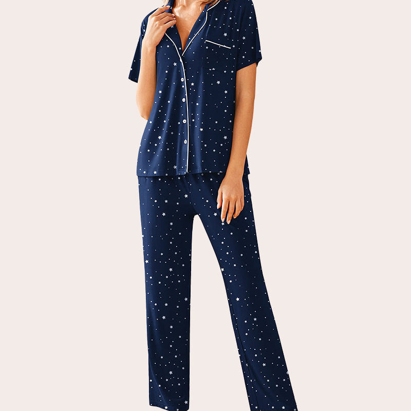 Navy blue notch collar soft pajamas set with white stars, featuring button-down top and long pants.