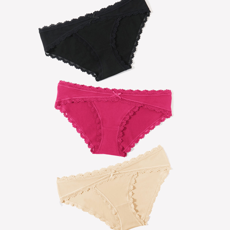 Cotton hipster panties in black, pink, and beige with lace trim and bow detail