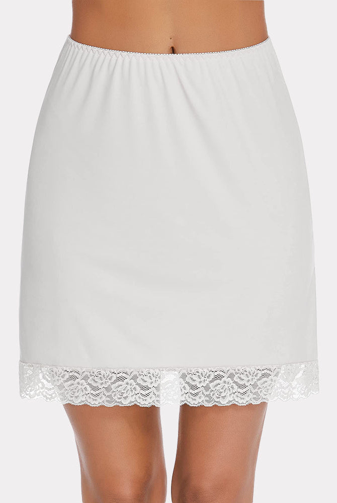 White half slip skirt with lace trim, above knee length, and elastic waist for comfort
