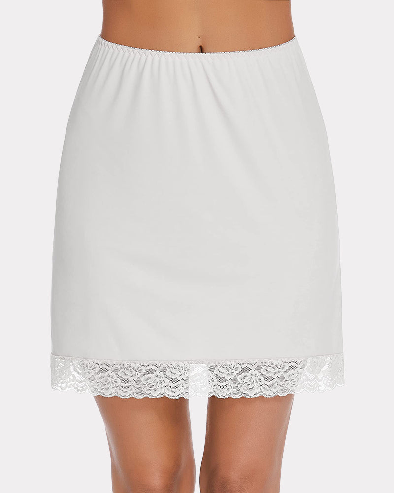 White half slip skirt with lace trim, above knee length, and elastic waist for comfort