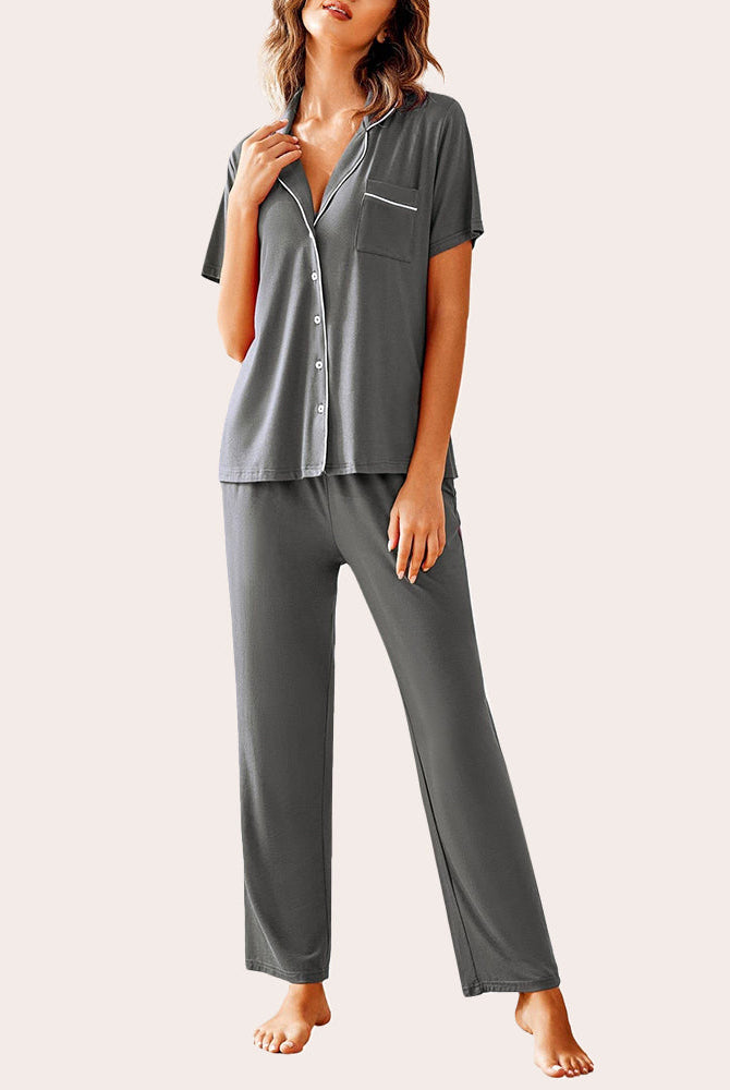 Charcoal gray notch collar soft pajamas set with white trim, button-down top, and long pants.