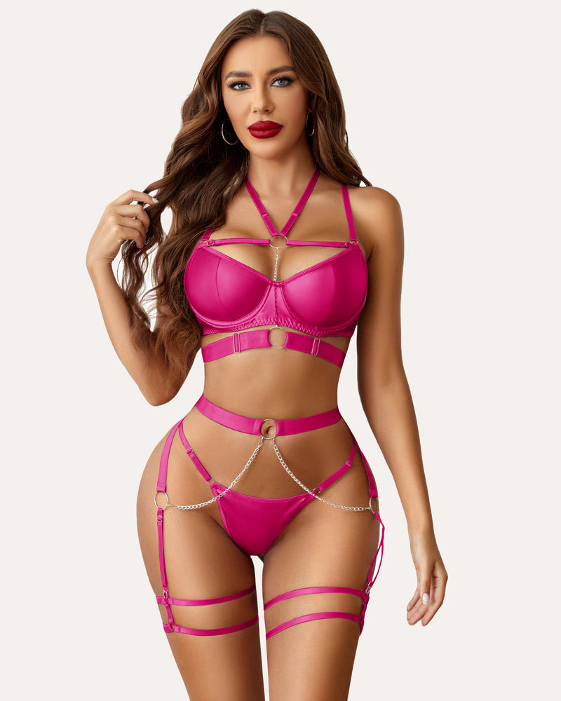 Fuchsia leather lingerie set with chain details, push-up bra, garter. Confident and sexy look.