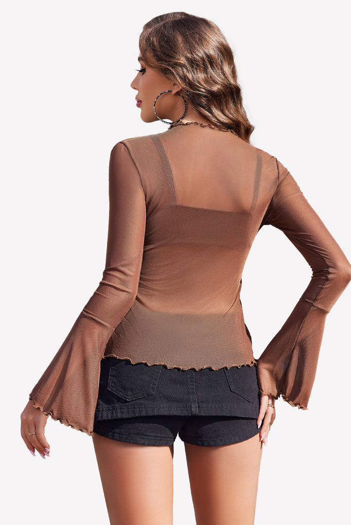 Brown mesh top with bell sleeves, mock neck, and black shorts. A stylish, vintage-inspired look.