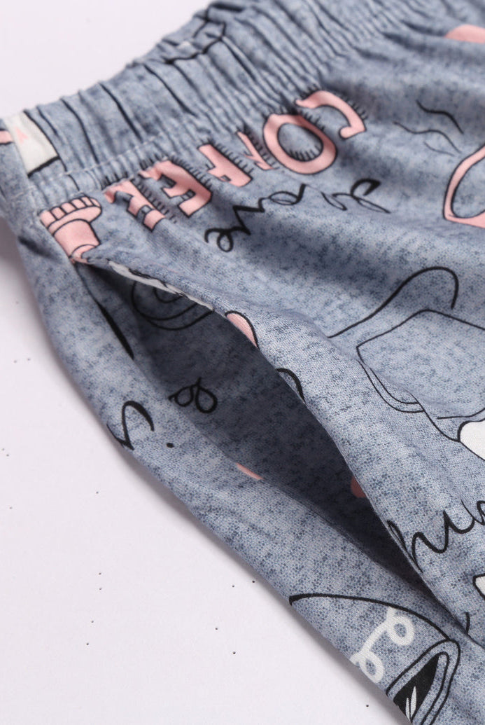 Grey printed pajama shorts with elastic waist and doodle cup and heart motifs.