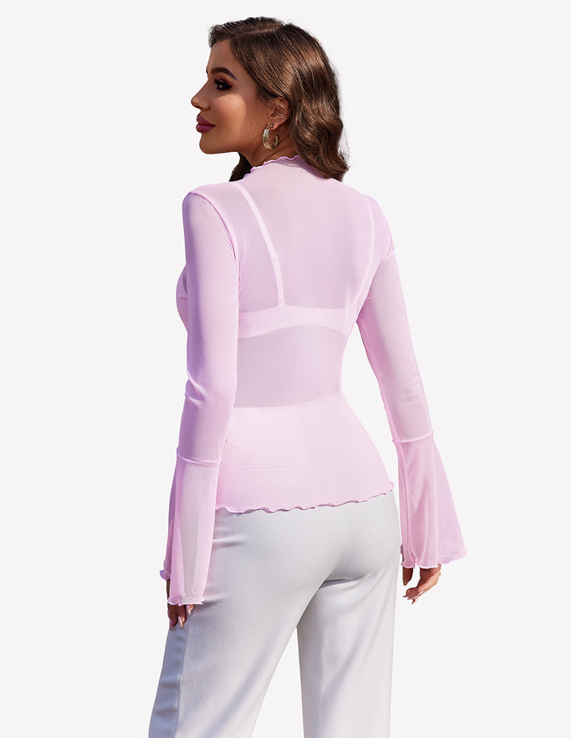 Pink mesh bell sleeve top with bell sleeves and white pants, a stylish look