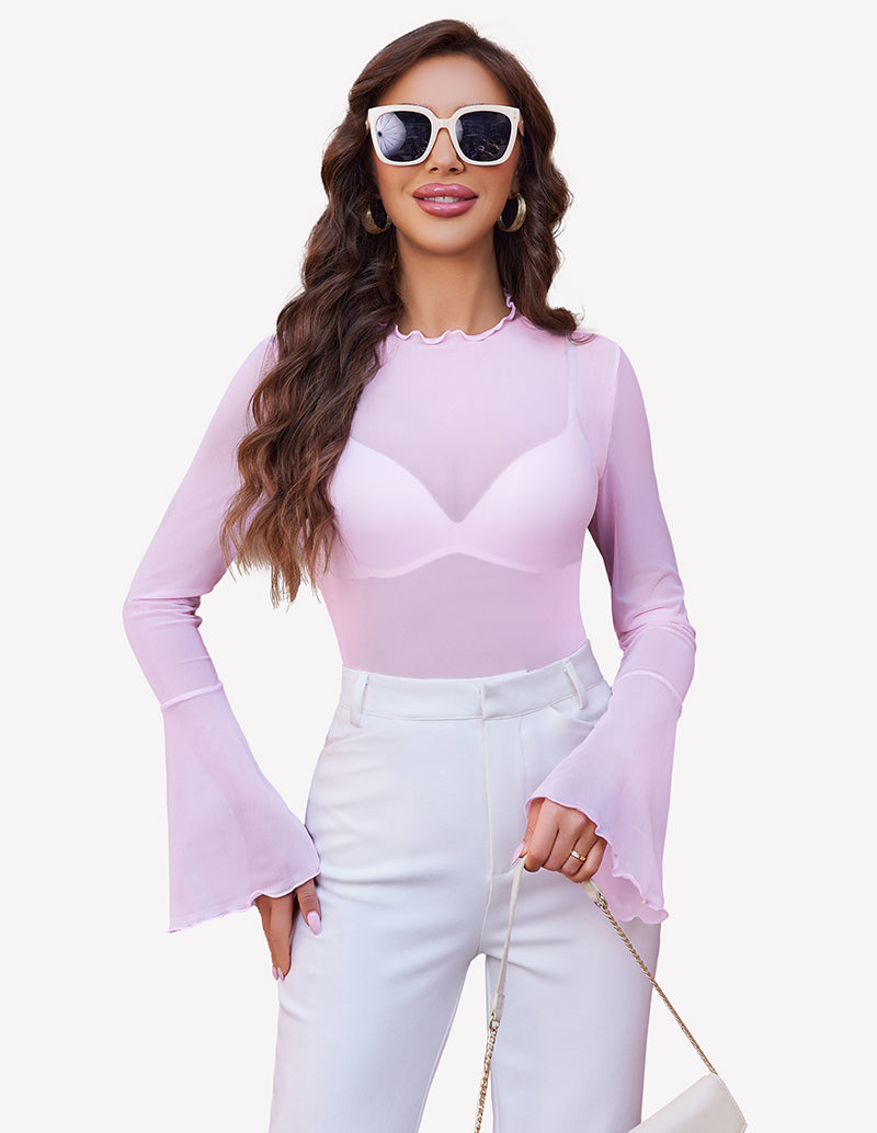 Pink mesh bell sleeve top with white pants. A stylish and confident look.